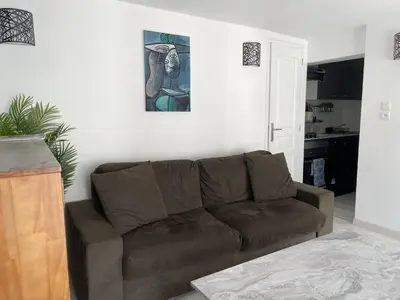 Coin salon dans l'établissement Magnifique logement au pied du Château