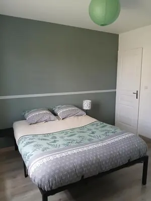 Un ou plusieurs lits dans un hébergement de l'établissement Chambres