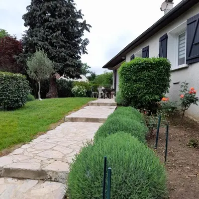 Jardin de l'établissement Chambre à 5 minutes du circuit