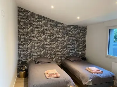 Un ou plusieurs lits dans un hébergement de l'établissement Les prunelles maison de village de 4 à 8 personnes