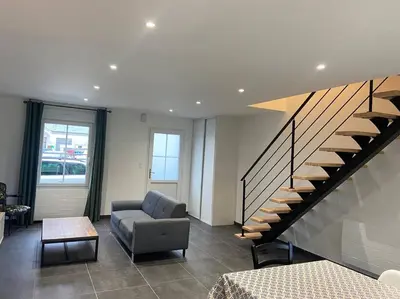 Coin salon dans l'établissement Les prunelles maison de village de 4 à 8 personnes