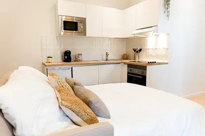 Cuisine ou kitchenette dans l'établissement Le naturel - Superbe logement - Extérieur privatif - Centre ville