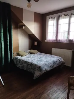 Un ou plusieurs lits dans un hébergement de l'établissement Maison Le Mans
