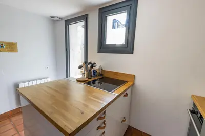 Cuisine ou kitchenette dans l'établissement Les marmousets, 5 minutes du Zoo