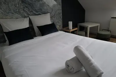 Un ou plusieurs lits dans un hébergement de l'établissement Balcon sur Loire
