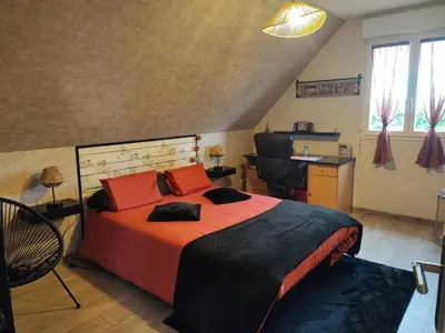 Un ou plusieurs lits dans un hébergement de l'établissement Chambre à louer proche circuit