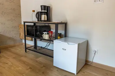 Cuisine ou kitchenette dans l'établissement La Suite Littéraire, 5mn du ZooParc de Beauval