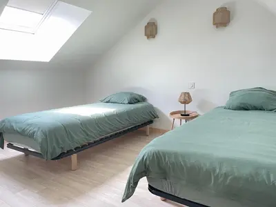 Un ou plusieurs lits dans un hébergement de l'établissement Logement entier à la campagne proche du circuit et du zoo de la Flèche