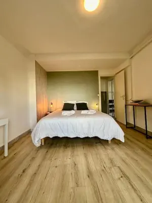 Un ou plusieurs lits dans un hébergement de l'établissement Loft avec parking centre Tours et bord du Cher Loire Valley