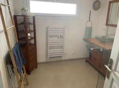 Cuisine ou kitchenette dans l'établissement Logement à 5 minutes du circuit