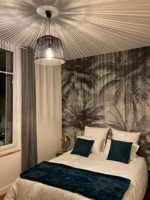 Un ou plusieurs lits dans un hébergement de l'établissement Hyper centre lumineux avec balcon