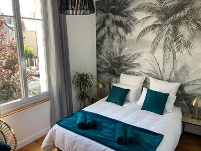 Un ou plusieurs lits dans un hébergement de l'établissement Hyper centre lumineux avec balcon