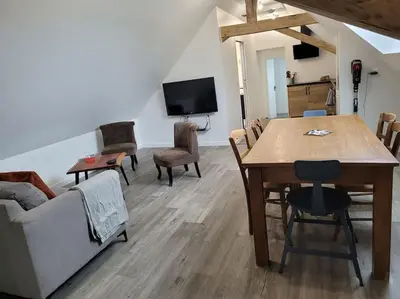 Télévision ou salle de divertissement dans l'établissement Appartement proche circuit