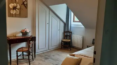 Coin salon dans l'établissement Gîte Les Rimbaudières à Ligueil