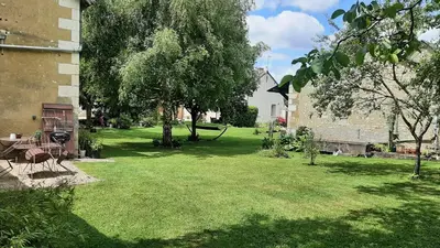 Jardin de l'établissement Gîte Les Rimbaudières à Ligueil