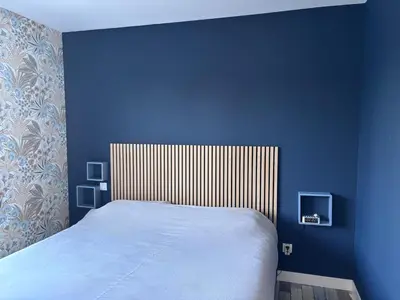 Un ou plusieurs lits dans un hébergement de l'établissement Chambre privée à 10 min du circuit