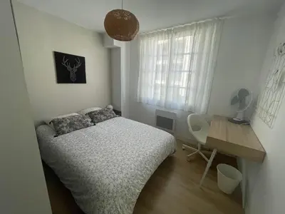 Un ou plusieurs lits dans un hébergement de l'établissement Bel appartement 6p Tours Centre