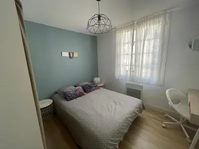 Un ou plusieurs lits dans un hébergement de l'établissement Bel appartement 6p Tours Centre