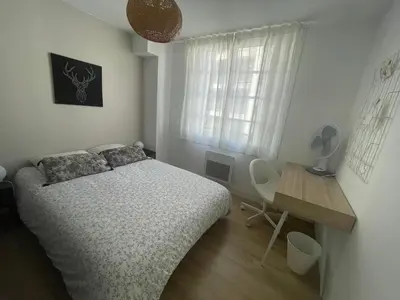 Un ou plusieurs lits dans un hébergement de l'établissement Bel appartement 6p Tours Centre