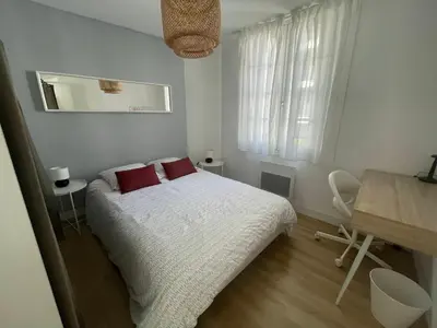 Un ou plusieurs lits dans un hébergement de l'établissement Bel appartement 6p Tours Centre