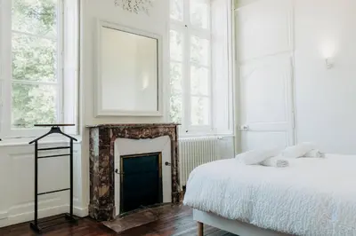 Un ou plusieurs lits dans un hébergement de l'établissement Château de Marigné - Gîte de charme- 15 pl
