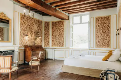 Un ou plusieurs lits dans un hébergement de l'établissement Château de Marigné - Gîte de charme- 15 pl
