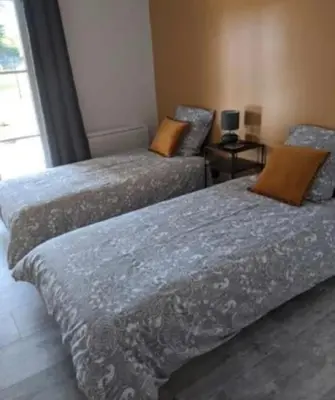 Un ou plusieurs lits dans un hébergement de l'établissement Maison 5 personnes
