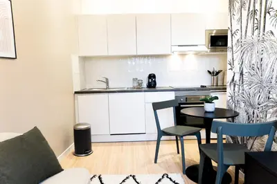 Cuisine ou kitchenette dans l'établissement Le Tropical - Beau logement centre - Gare - Tram