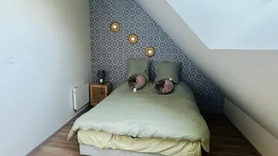 Un ou plusieurs lits dans un hébergement de l'établissement Charmante maison à Blois - Terrasse privée - 8 pers