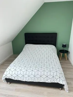 Un ou plusieurs lits dans un hébergement de l'établissement Chambres 24h du Mans