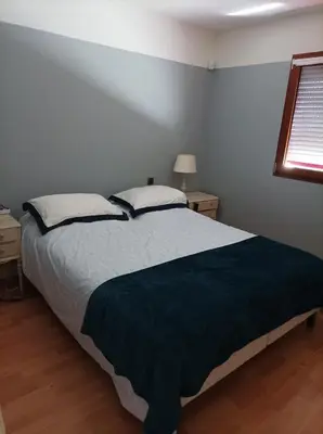 Un ou plusieurs lits dans un hébergement de l'établissement Chambre d'hotes