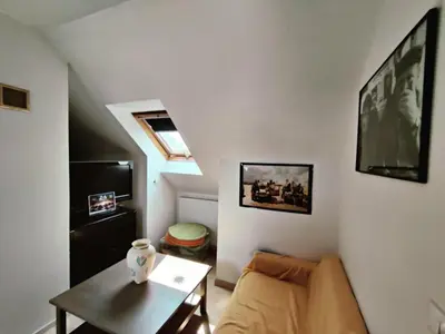 Télévision ou salle de divertissement dans l'établissement WELCOME TO LE MANS