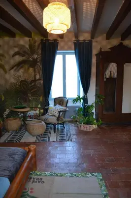 Coin salon dans l'établissement La Petite Ferme