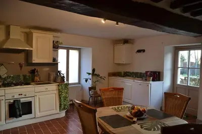 Cuisine ou kitchenette dans l'établissement La Petite Ferme