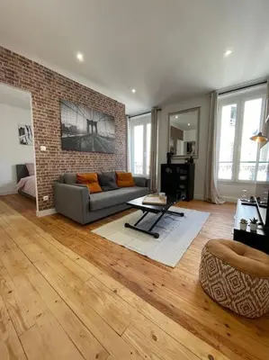Coin salon dans l'établissement Le New York Appart' T1 Bis au centre du MANS
