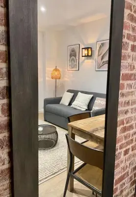 Coin salon dans l'établissement Le Marrakech Appart' T1 au centre du Mans