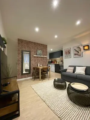Coin salon dans l'établissement Le Marrakech Appart' T1 au centre du Mans