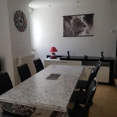 Coin salon dans l'établissement Appartement Malawo