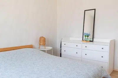 Un ou plusieurs lits dans un hébergement de l'établissement Charmant appartement - 5 mn Zoo de Beauval 4p