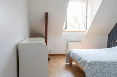 Un ou plusieurs lits dans un hébergement de l'établissement Superbe appartement - 5 mn du Zoo de Beauval (8p)