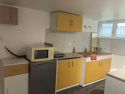 Cuisine ou kitchenette dans l'établissement Giret's Studio privé