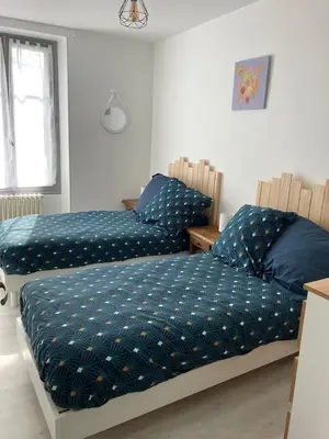 Un ou plusieurs lits dans un hébergement de l'établissement GITE DE LA CAZELLERIE