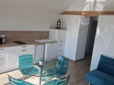 Cuisine ou kitchenette dans l'établissement Gite Les Courbes