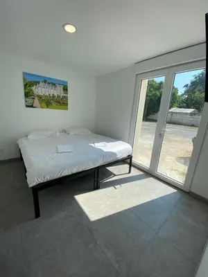 Un ou plusieurs lits dans un hébergement de l'établissement Appartement 8pers à Vallères