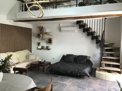 Coin salon dans l'établissement Loft à Tours Nord