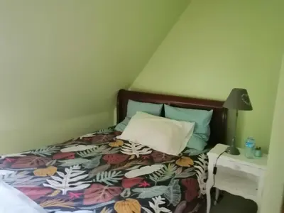 Un ou plusieurs lits dans un hébergement de l'établissement Chambre d'hôtes La Montjoie