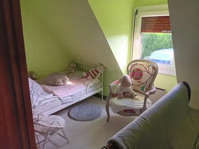 Coin salon dans l'établissement Chambre d'hôtes La Montjoie