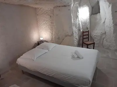 Un ou plusieurs lits dans un hébergement de l'établissement La troglodyte fantastique Lochoise
