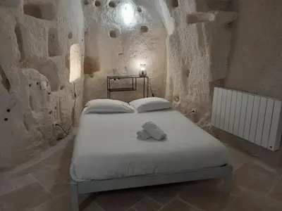Un ou plusieurs lits dans un hébergement de l'établissement La troglodyte fantastique Lochoise