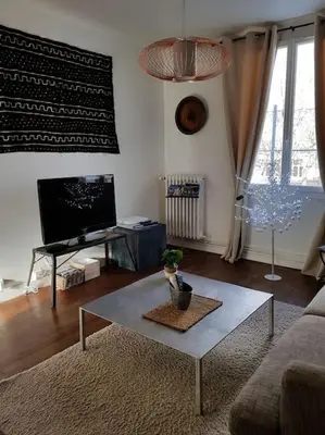 Télévision ou salle de divertissement dans l'établissement L'APPART de 75 m², déco sympa à Tours